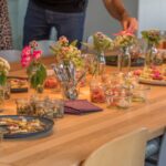 Auf dem Tisch stehen verschiedene Snacks und Kleinigkeiten bei einem Tasting Event in der Concept Kitchen in München